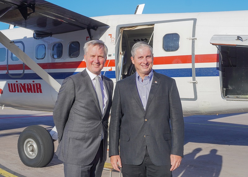 State Secretary Van Der Burg And Island Governor Johnson In Front Of Aircraft